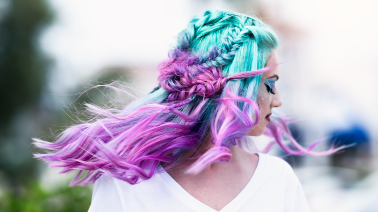 Woman with light blue and purple acid hair